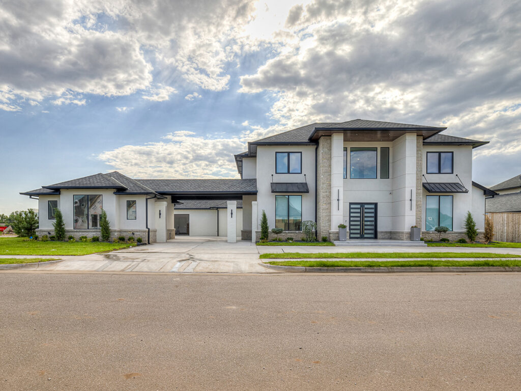 Grand exterior of a modern transitional home with clean lines and neutral tones
